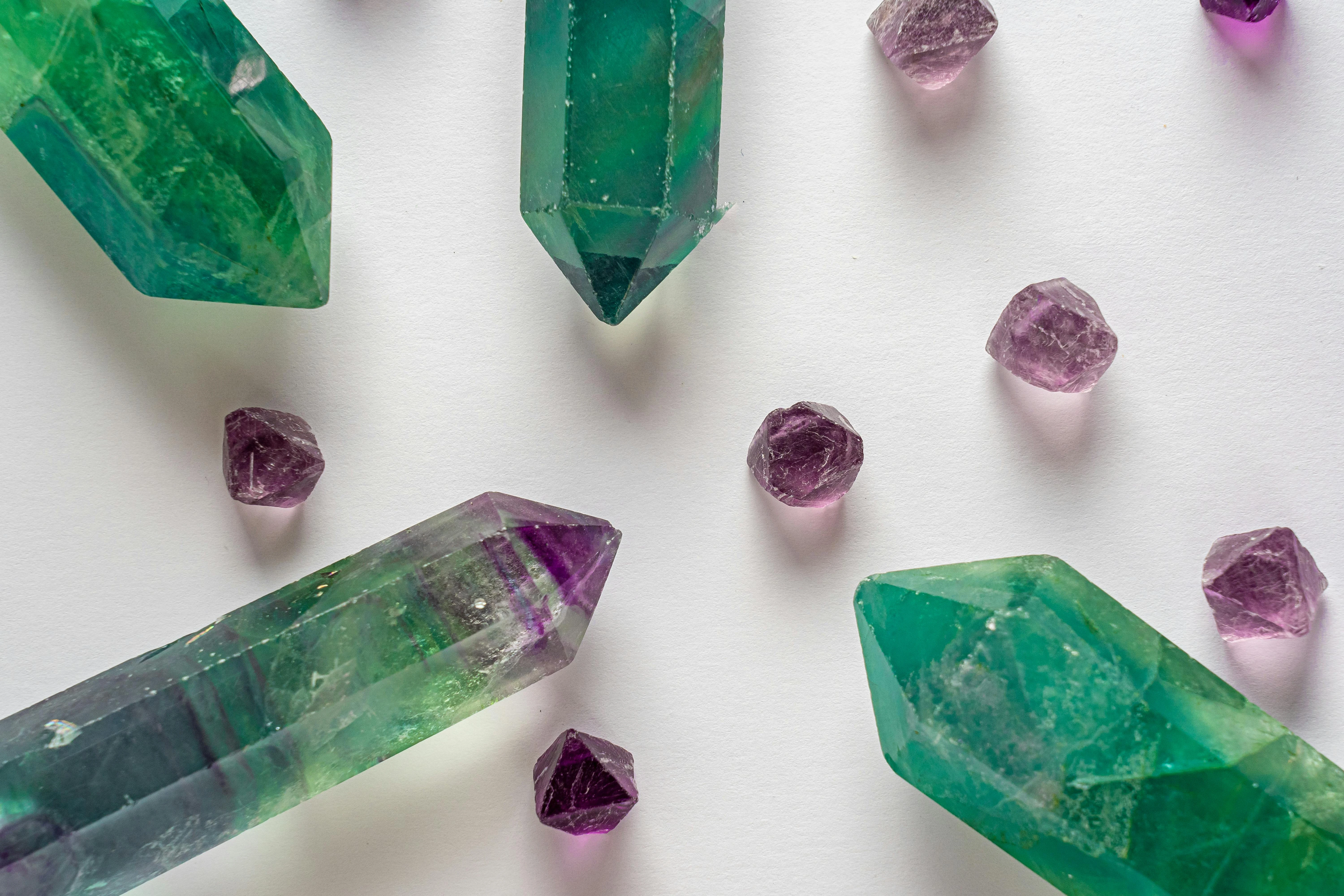 Vibrant green and purple tourmaline crystals showcasing natural color zoning