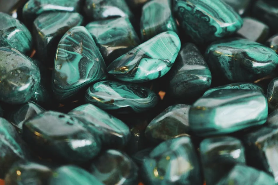 Polished malachite pebbles with eye patterns